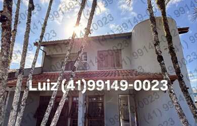 Imagem: A casa possui 3 Dormitórios, 3 Banheiros, 5 Vagas na garagem