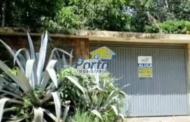 Imagem: A casa possui 4 Dormitórios, 1 Banheiro, 5 Vagas na garagem