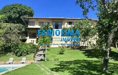 Imagem: A casa em condomínio possui 5 Dormitórios, 5 Banheiros, 4