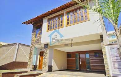 Imagem: A casa possui 4 Dormitórios, 4 Banheiros, 4 Vagas na garagem