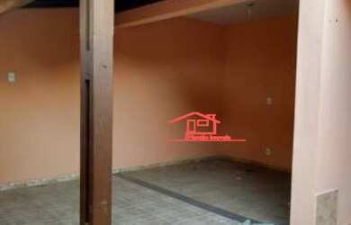 Imagem: A casa possui 3 Dormitórios, 2 Banheiros, 2 Vagas na garagem