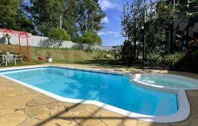 Imagem: A casa em condomínio possui 3 Dormitórios, 4 Banheiros, 5