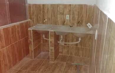 Imagem: A casa possui 5 Dormitórios, 2 Banheiros, 4 Vagas na garagem