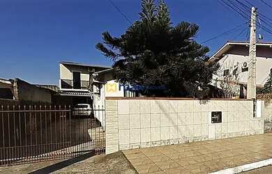 Imagem: A casa possui 2 Dormitórios, 2 Banheiros, 1 Vaga na garagem