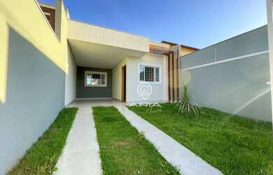 Imagem: A casa possui 3 Dormitórios, 3 Banheiros, 2 Vagas na garagem