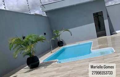 Imagem: A casa possui 2 Dormitórios, 1 Banheiro, 2 Vagas na garagem