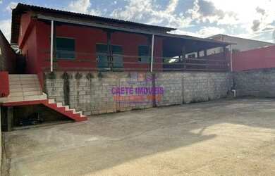 Imagem: A casa possui 3 Dormitórios, 1 Banheiro, 5 Vagas na garagem