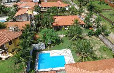 Imagem: A casa possui 3 Dormitórios, 3 Banheiros, 5 Vagas na garagem