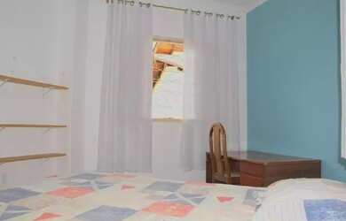 Imagem: A casa possui 4 Dormitórios, 2 Banheiros, 3 Vagas na garagem