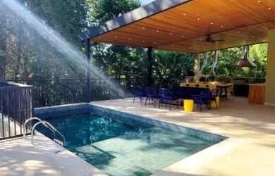 Imagem: A casa em condomínio possui 5 Dormitórios, 5 Banheiros, 5