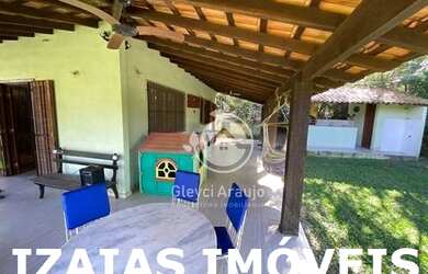 Imagem: A casa possui 4 Dormitórios, 3 Banheiros, 5 Vagas na garagem