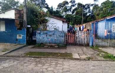 Imagem: A casa possui 2 Dormitórios, 1 Banheiro, 1 Vaga na garagem
