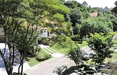 Imagem: A casa em condomínio possui 4 Dormitórios, 5 Banheiros, 4