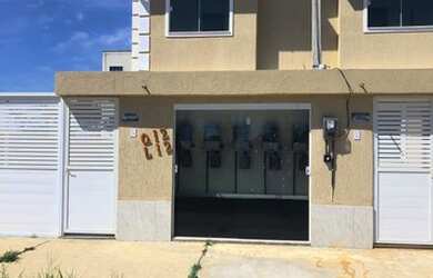 Imagem: A casa possui 2 Dormitórios, 3 Banheiros, 1 Vaga na garagem