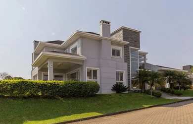 Imagem: A casa em condomínio possui 3 Dormitórios, 4 Banheiros, 2