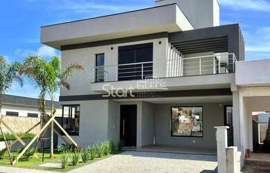 Imagem: A casa em condomínio possui 3 Dormitórios, 4 Banheiros, 2