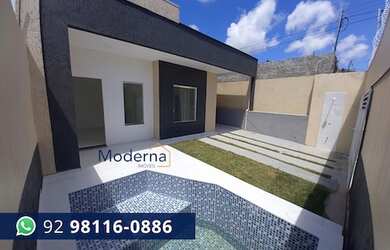 Imagem: A casa possui 3 Dormitórios, 2 Banheiros, 2 Vagas na garagem