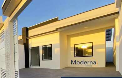 Imagem: A casa possui 3 Dormitórios, 2 Banheiros, 2 Vagas na garagem