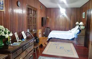 Imagem: A casa possui 3 Dormitórios, 3 Banheiros, 2 Vagas na garagem