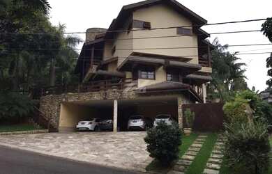 Imagem: A casa em condomínio possui 5 Dormitórios, 5 Banheiros, 4