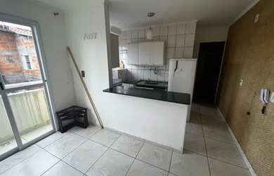 Imagem: O apartamento possui 1 Dormitório, 1 Banheiro, 1 Vaga na garagem