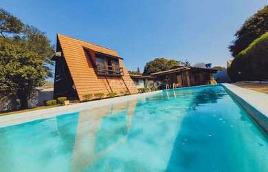 Imagem: A casa em condomínio à venda possui 3 Dormitórios, 1 Banheiro