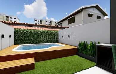 Imagem: A casa possui 3 Dormitórios, 2 Banheiros, 2 Vagas na garagem