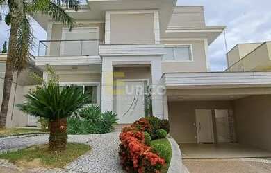 Imagem: A casa em condomínio possui 4 Dormitórios, 5 Banheiros, 4