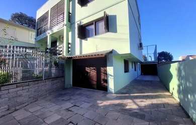 Imagem: O apartamento possui 3 Dormitórios, 1 Banheiro, 2 Vagas na