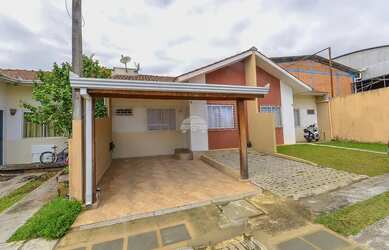 Imagem: A casa possui 3 Dormitórios, 2 Banheiros, 2 Vagas na garagem