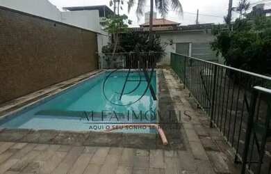 Imagem: A casa possui 5 Dormitórios, 5 Banheiros, 5 Vagas na garagem