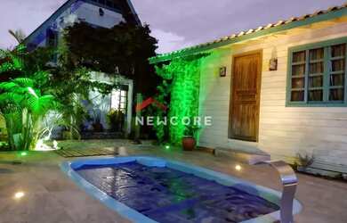 Imagem: A casa possui 4 Dormitórios, 2 Banheiros, 3 Vagas na garagem