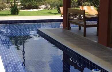 Imagem: A casa possui 4 Dormitórios, 5 Banheiros, 350m² de Área