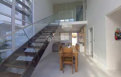 Imagem: A casa em condomínio possui 3 Dormitórios, 3 Banheiros, 2