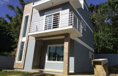 Imagem: A casa possui 3 Dormitórios, 2 Banheiros, 3 Vagas na garagem