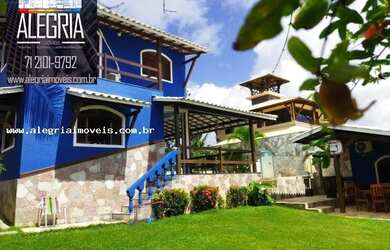 Imagem: A casa possui 4 Dormitórios, 4 Banheiros, 4 Vagas na garagem