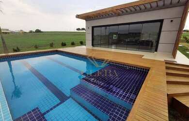 Imagem: A casa em condomínio possui 3 Dormitórios, 4 Banheiros, 2