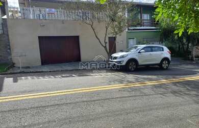 Imagem: A casa possui 3 Dormitórios, 3 Banheiros, 2 Vagas na garagem