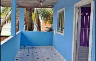 Imagem: A casa possui 2 Dormitórios, 1 Banheiro, 1 Vaga na garagem