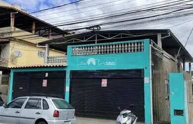 Imagem: A casa possui 3 Dormitórios, 1 Banheiro, 3 Vagas na garagem