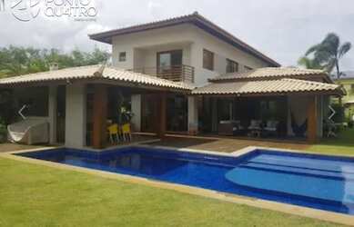 Imagem: A casa possui 4 Dormitórios, 5 Banheiros, 4 Vagas na garagem