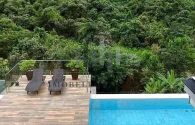 Imagem: A casa em condomínio possui 5 Dormitórios, 5 Banheiros, 5