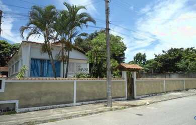 Imagem: A casa à venda possui 3 Dormitórios, 2 Banheiros, 3 Vagas