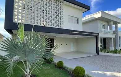 Imagem: A casa em condomínio possui 4 Dormitórios, 5 Banheiros, 4