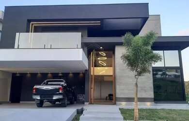 Imagem: A casa possui 4 Dormitórios, 5 Banheiros, 5 Vagas na garagem