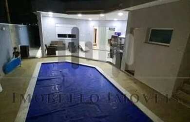 Imagem: A casa possui 3 Dormitórios, 3 Banheiros, 3 Vagas na garagem