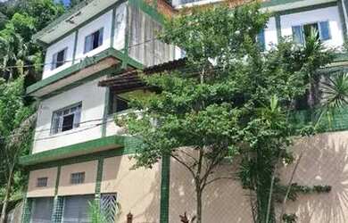 Imagem: A casa possui 5 Dormitórios, 5 Banheiros, 2 Vagas na garagem