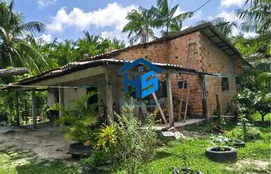 Imagem: A casa possui 2 Dormitórios, 1 Banheiro, 4 Vagas na garagem