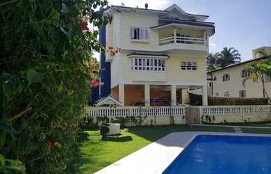 Imagem: A casa em condomínio possui 4 Dormitórios, 5 Banheiros, 5