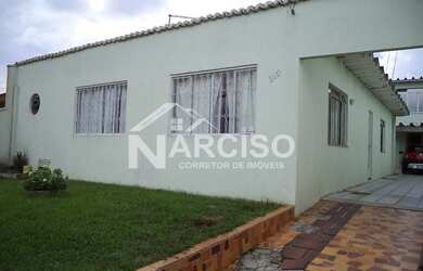 Imagem: A casa possui 3 Dormitórios, 4 Banheiros, 5 Vagas na garagem